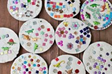 DIY colorful mosaic stepping stones with dinosaurs