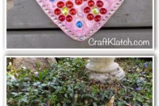 DIY pink heart stepping stone with embellishments