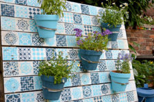 DIY painted wood pallet garden with a Moroccan pattern