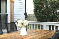 DIY outdoor dining table with honey-colored stain