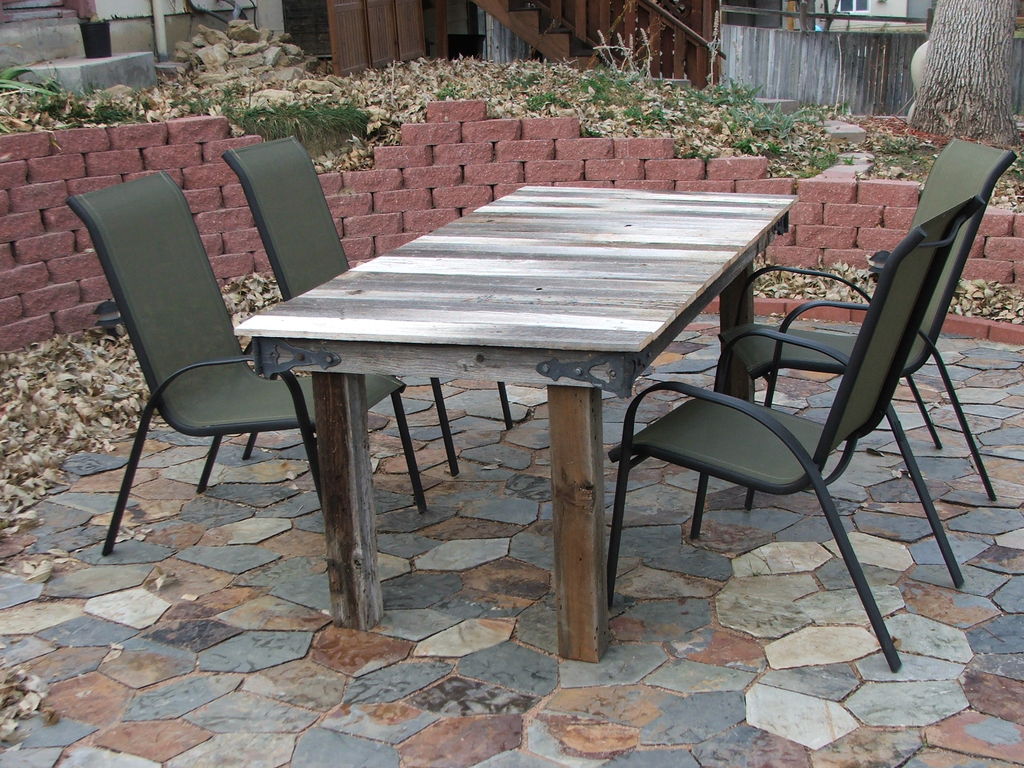 DIY outdoor dining table made of a gate