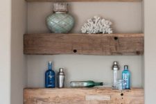 rough wooden slab shelves that occupy an awkward corner and make it functional and practical