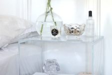 14 an acrylic nightstand with a vintage design looks really amazing and refreshing