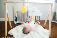 DIY bright and fun baby gym with a rainbow cloud