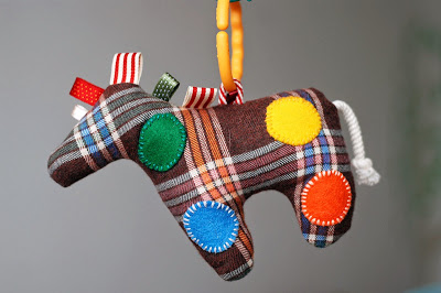 DIY baby horse toy with tags (via www.thethings-we-do.com)