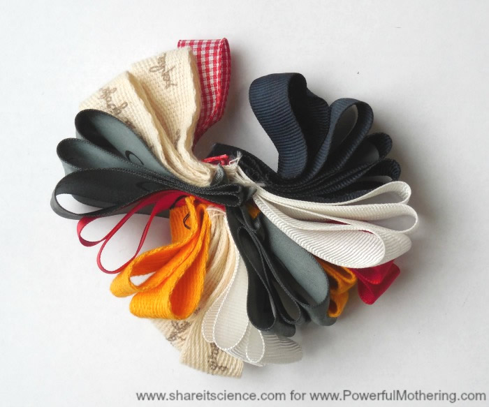 DIY simple ribbon tag toy for babies (via www.powerfulmothering.com)