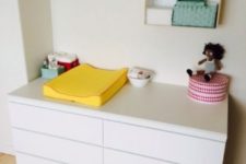 22 sleek IKEA Malm dresser used as a changing table is a great solution for many nurseries