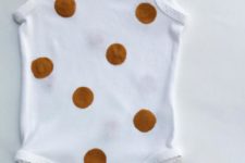 DIY polka dot and gold bow onesie