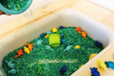DIY dyed rice and dinosaur sensory bin