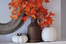 02 a beautiful bright fall leaf arrangement in a vintage metal jug is a cool and bright idea for your mantel