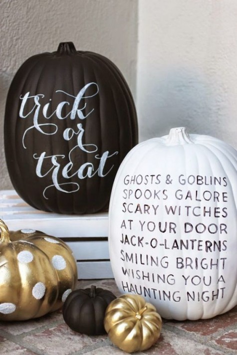 a chalkboard pumpkin and a white one with black letters for modern Halloween decor, add soem metallic touches like here