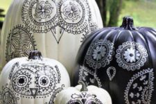 03 cool owl-inspired black and white pumpkins will add a whimsical and creative touch to your Halloween decor
