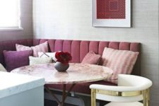 04 a burgundy upholstered bench and plum and pink pillows for a bold fall-infused eating space