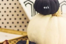 05 minimalist matte black and white pumpkins with EEK and BOO words are a perfect and easy decor idea