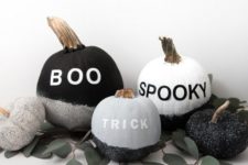 06 monochromatic pumpkins with stenciled letters, sparkles, greneery are great decorations for Halloween