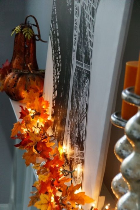 a bright fall leaf garland with lights will beautifully line up your mantel shelf or windsill