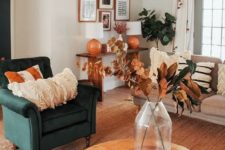 15 orange and rust decor touches bring a fall feel to the room and make it very welcoming