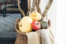 a fall basket display that is easy to make but looks gorgeous
