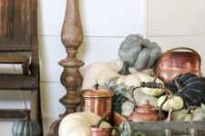 17 a farmhouse display with vintage drawers, copper teaware and colored pumpkins
