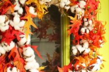 19 a fall wreath with bright fall leaves, cotton and a burlap ribbon to hang it is a very creative idea to try