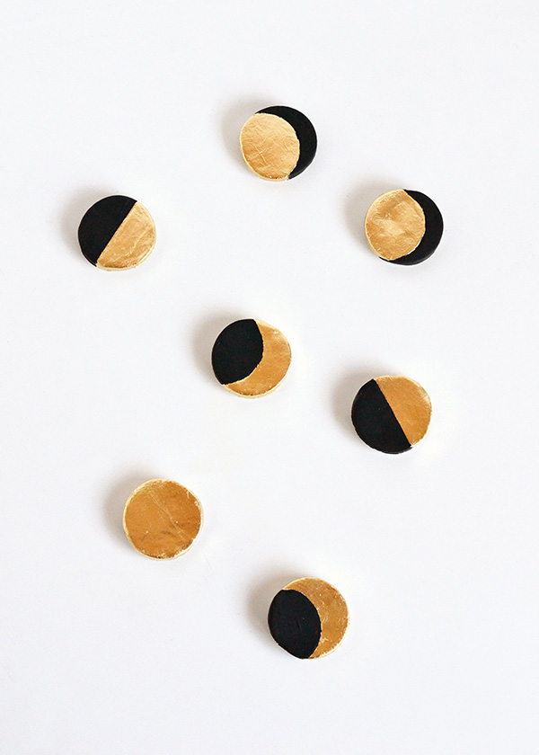 DIY black and gold moon phase magnets (via makeandtell.com)