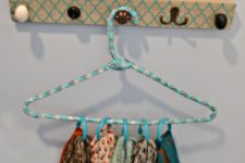 DIY scarf hanger using a clothes hanger and rings