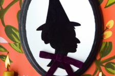 DIY witch silhouette decor with bright ribbons