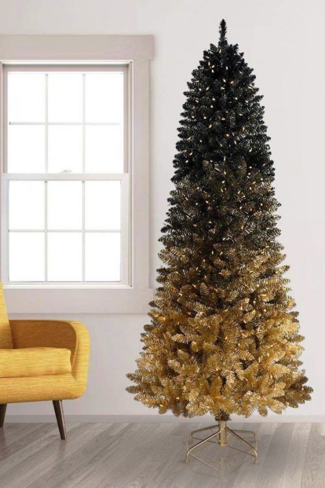 a bold gradient black to gold pre-lit Christmas tree is a gorgeous holiday statement in decor