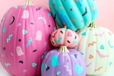 02 colorful 80s inspired painted and stenciled pumpkins will make your Halloween decor fun adn whimsy