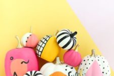 04 a batch of colorful and black and white painted pumpkins will fun up your party decor