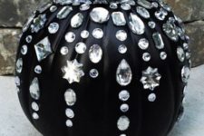 04 a matte black pumpkin with large crystals all over it is a cute and glam idea for a chic Halloween party