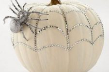 05 a white pumpkin with silver rhinestones and a silver spider is a glam and cool idea for Halloween