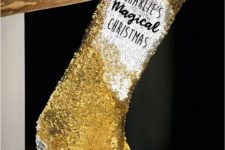22 a gold sequin stocking is a fun and glam idea to spruce up your Christmas mantel easily