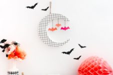 23 black and white Halloween decor spruced up with orange and pink details for a fun touch