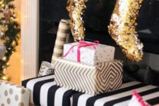 26 gold sequin stockings will add a fun and glam touch to the mantel