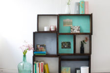 DIY wooden box shelving unit composed of several boxes