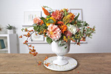 DIY vintage-inspired marigold and orange Thanksgiving floral arrangement