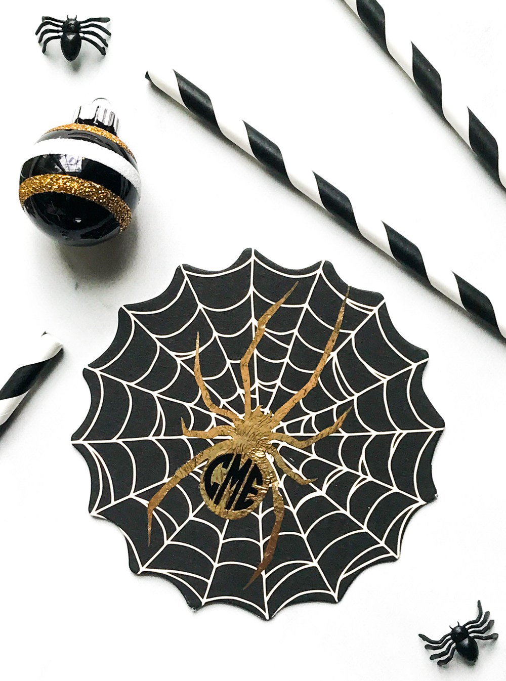 DIY black, white and gold spiderweb coasters for Halloween