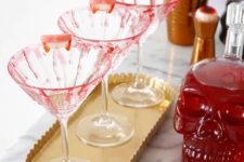 DIY bloody Halloween glasses with red sugar syrup