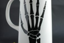 DIY black and white skeleton hand pitcher for Halloween