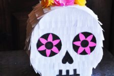 DIY sugar skull pinata for a Day of the Dead party