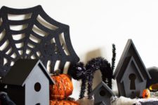 DIY haunted Halloween village using birdhouses