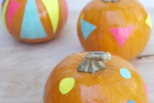 DIY Halloween pumpkins with neon stickers