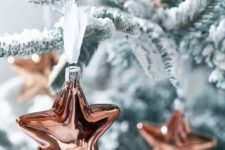 11 cute copper star Christmas ornaments will stand out on any Christmas tree and will add a trendy touch to the space