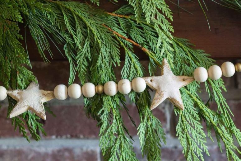 DIY salt dough star and wooden bead Christmas garland (via hearthandvine.com)