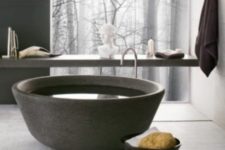 23 a unique bowl-like stone bathtub is an ultimate solution for a contemporary or minimalist bathroom