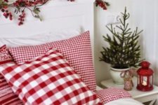 23 cover your headboard with berries and use red and white bedding for winter holidays