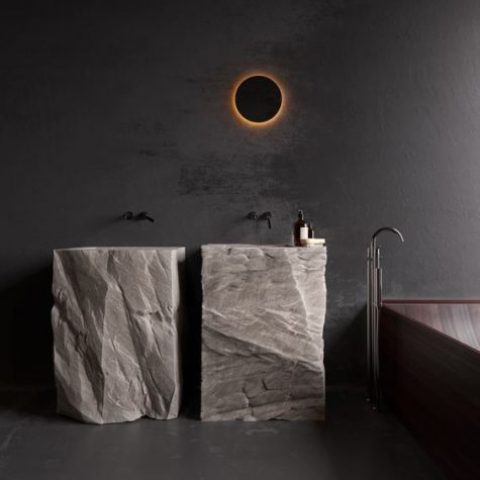 two free standing sinks cut out of rough stone looks extremely spectacular and super bold