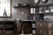an industrial home office with a large storage and working unit of metal, wooden shelving, a leather chair and metal lamps