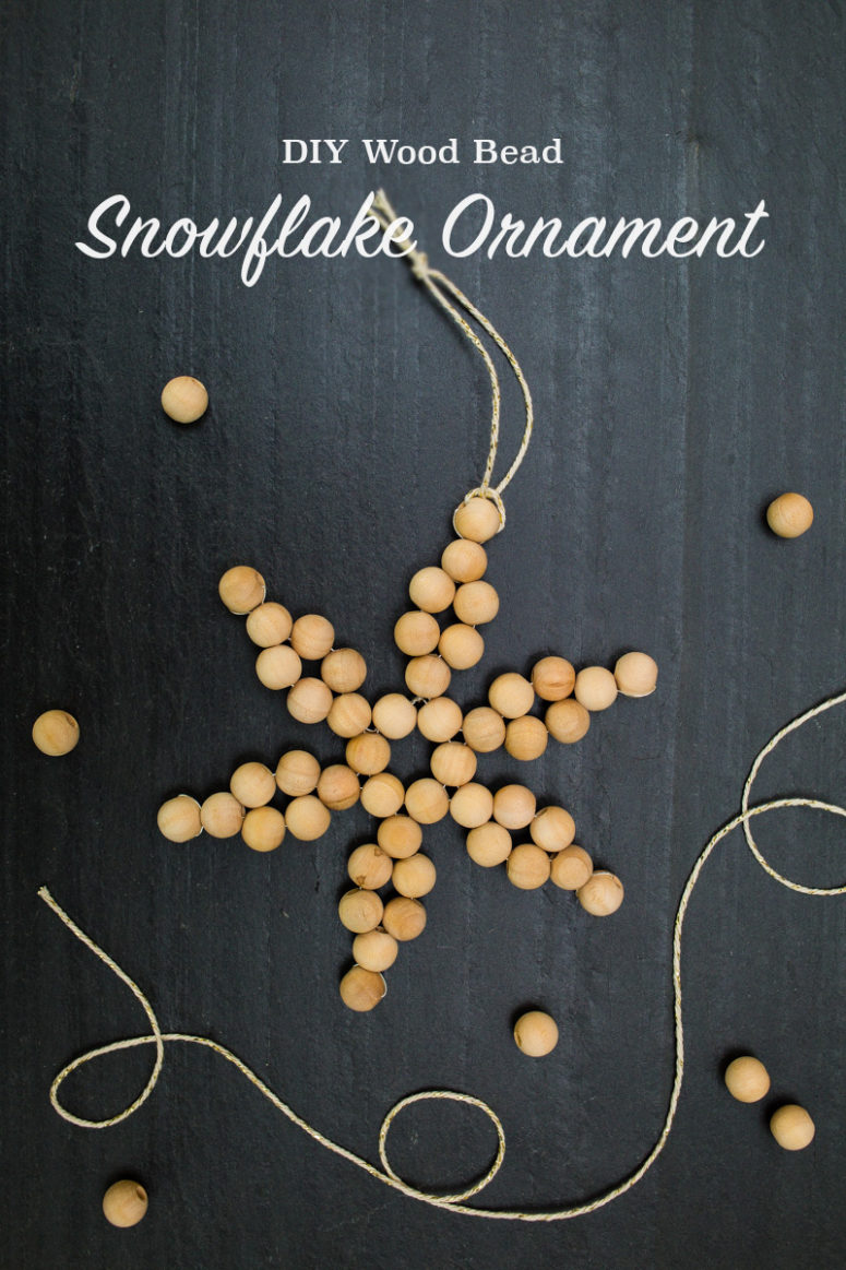 DIY wooden bead snowflake ornaments for Christmas (via tinselandtrim.com)